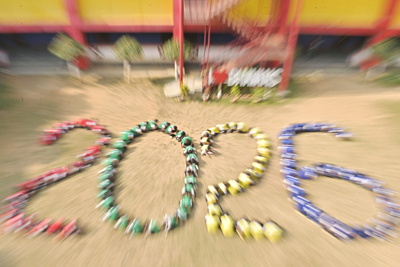 Students of Bhavans Tripura Vidyamandir school of Agartala make a stand in formation to show the year 2026 ahead of the New Year celebration in the school grounds on December 31.